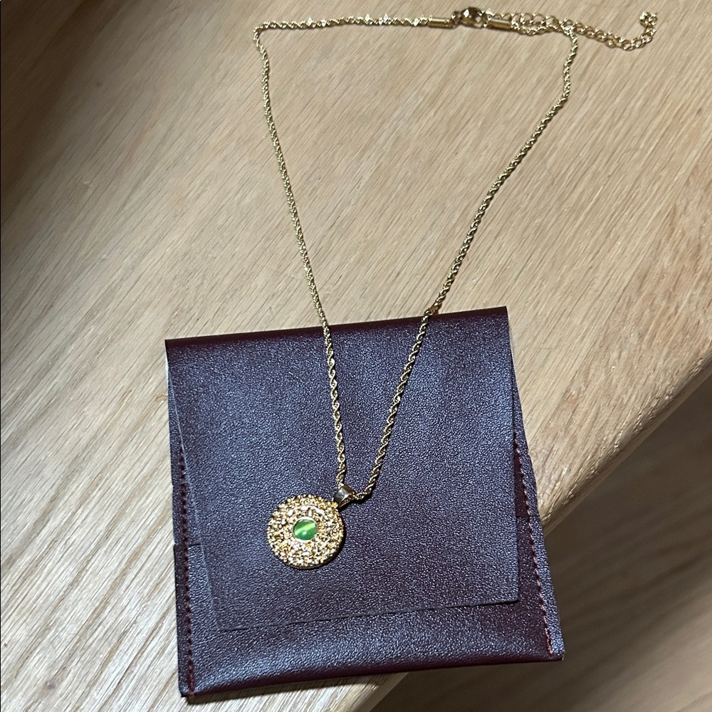 Golden Necklace with Green Gem Pendant